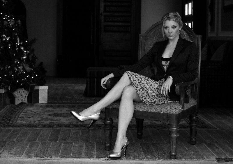 woman in formal attire sitting