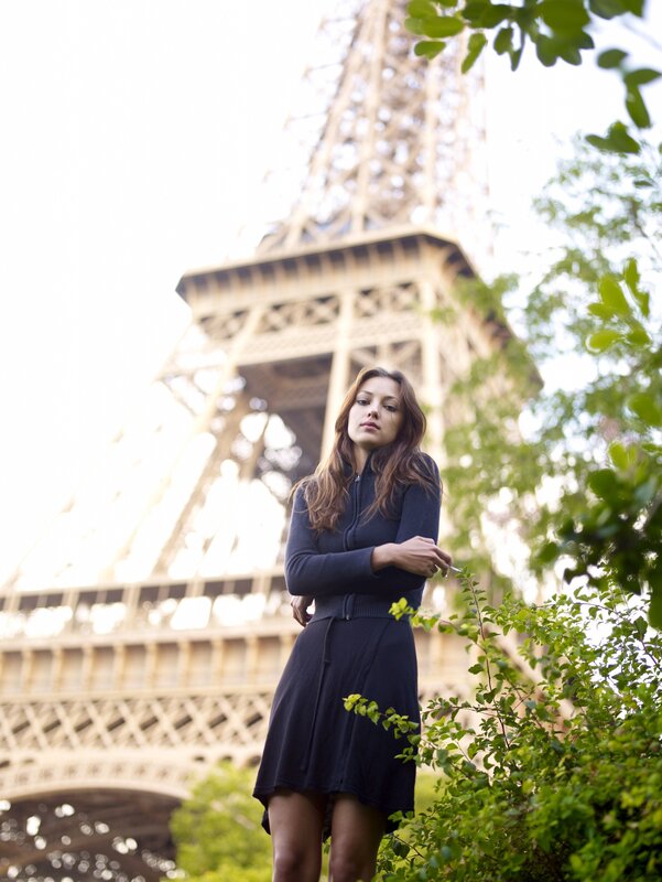 Woman in front of Eiffel Tower