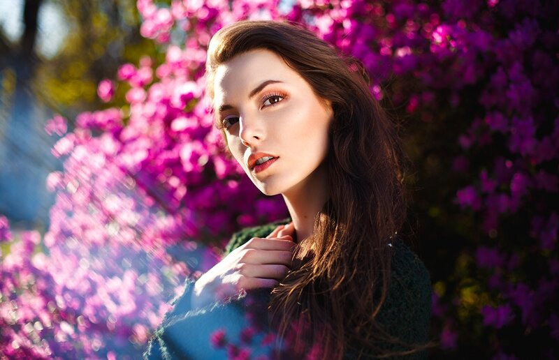 Woman in Front of Flowers — Purple