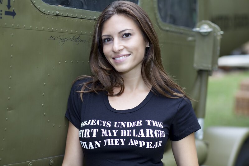 woman in front of military vehicle