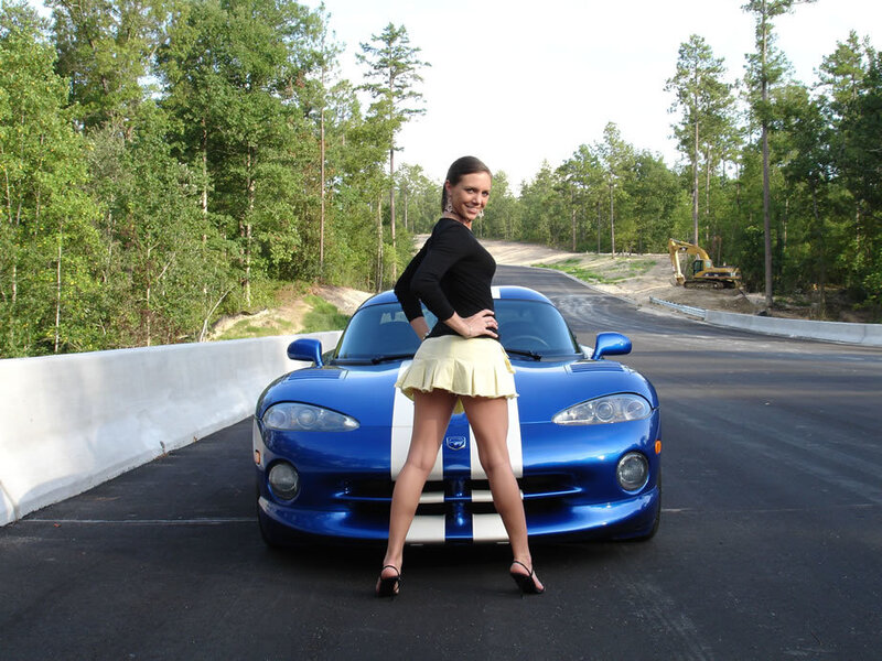 Woman in Front of Sports Car