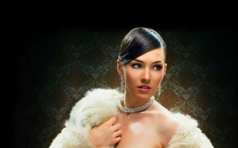 woman in fur coat and jewelry