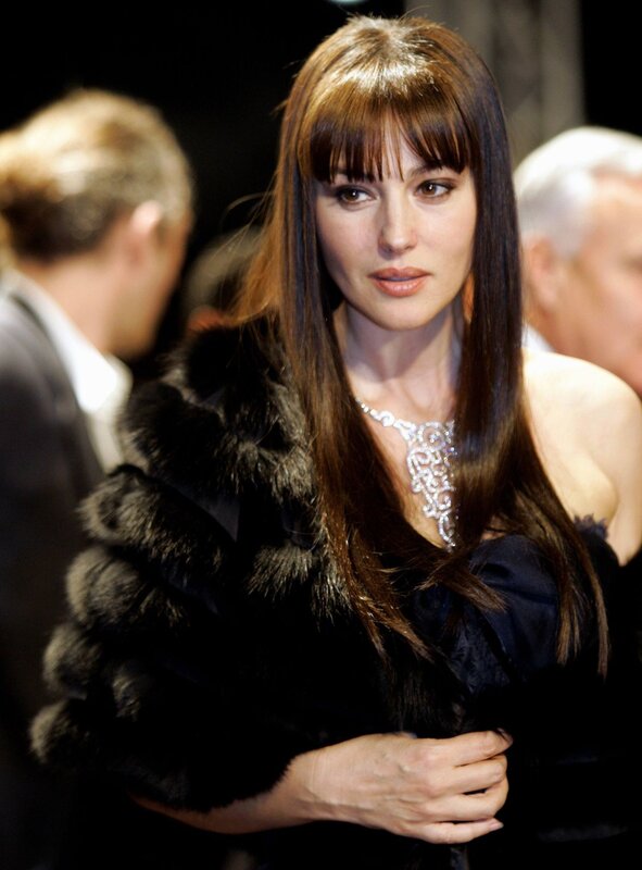 woman in fur coat at event