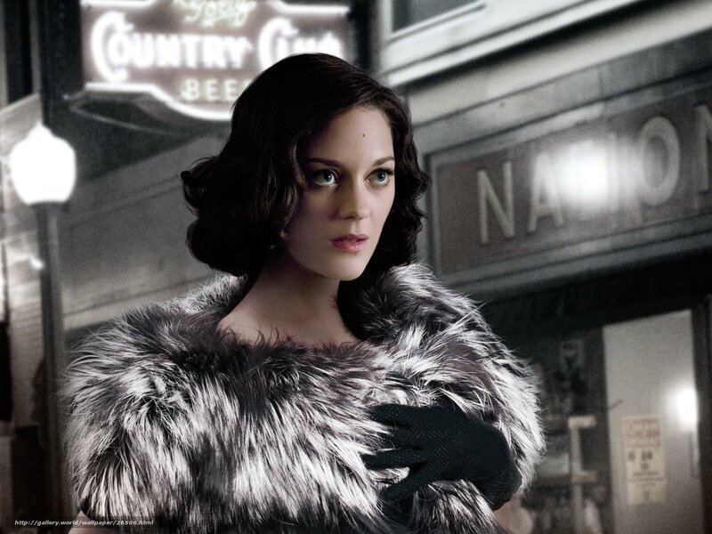 Woman in fur coat at night