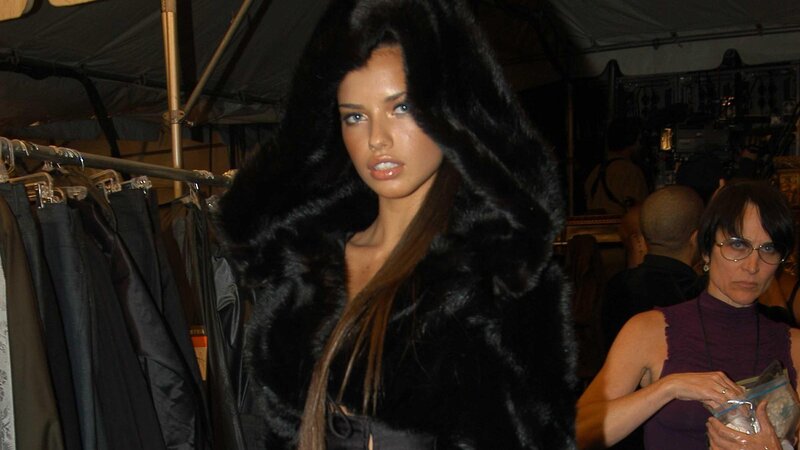 Woman in Fur Coat — Black, Serious