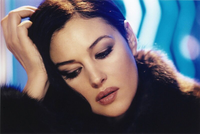woman in fur coat looking down