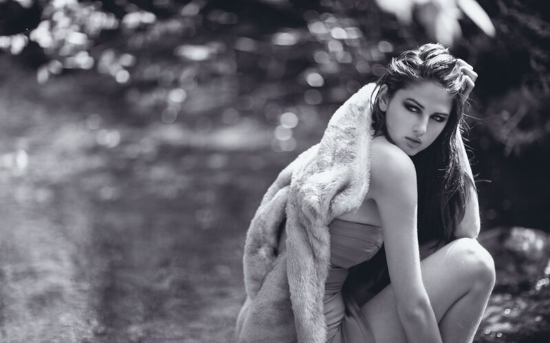 woman in fur coat outdoors