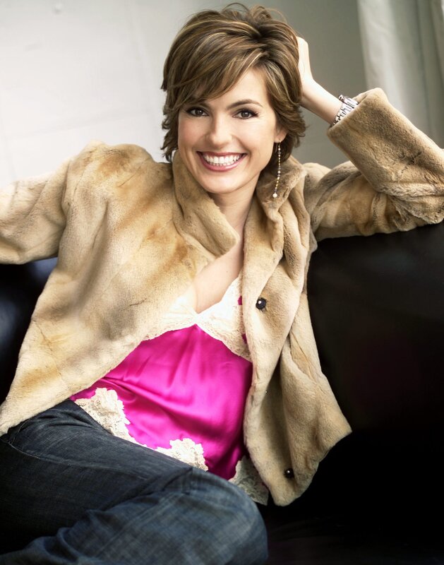 woman in fur coat smiling