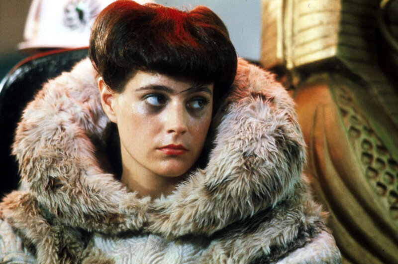 woman in fur coat with dark circles