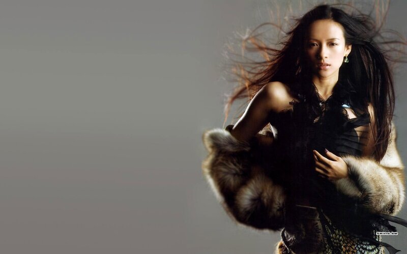 woman in fur coat with flowing hair