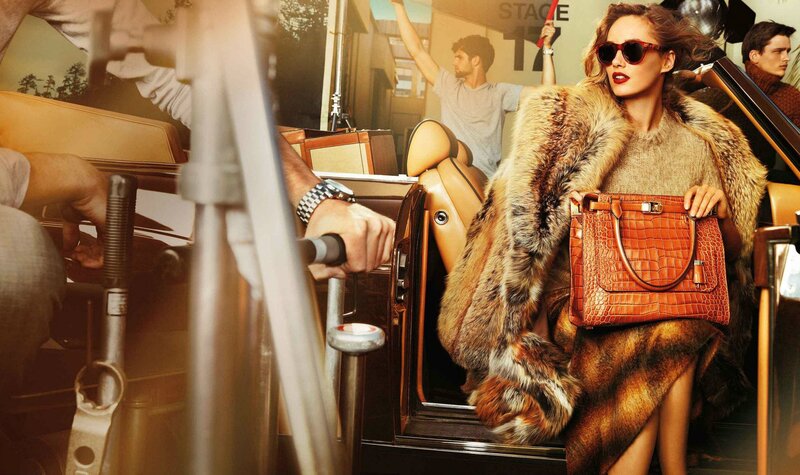 Woman in fur coat with handbag