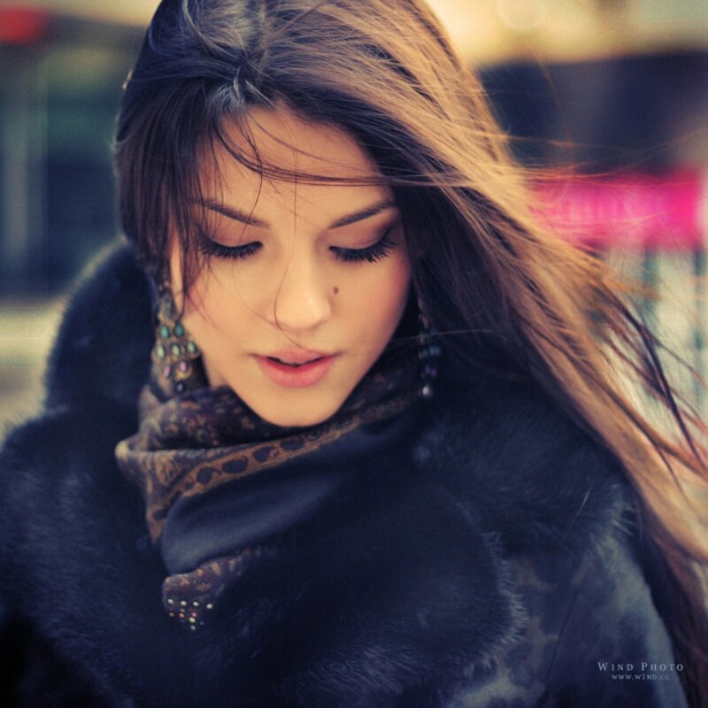 woman in fur coat with scarf