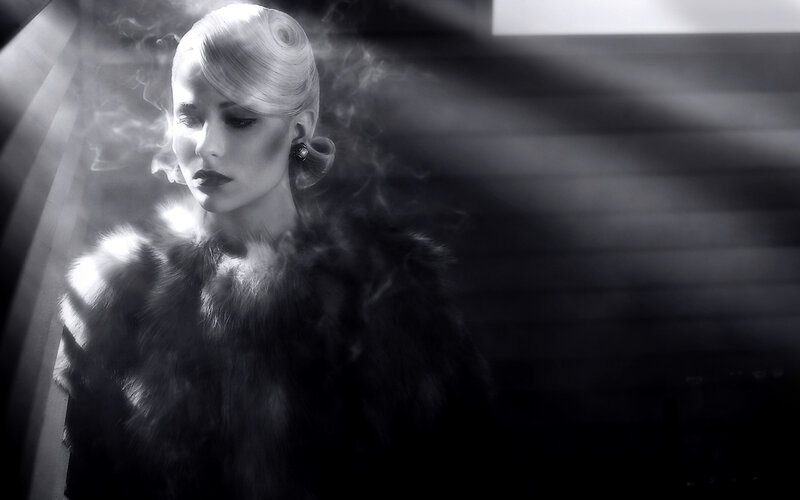 woman in fur coat with smoke