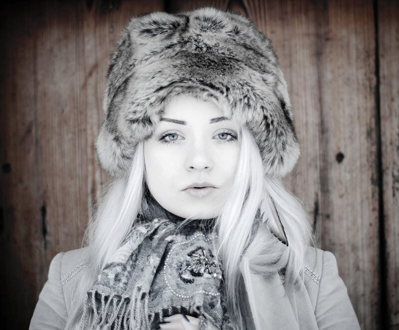 Woman in Fur Hat — Black, Serious
