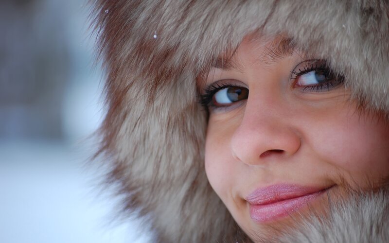 woman in fur hat outdoors