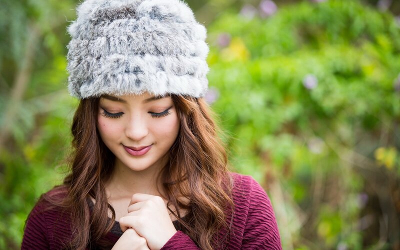 woman in fur hat outdoors