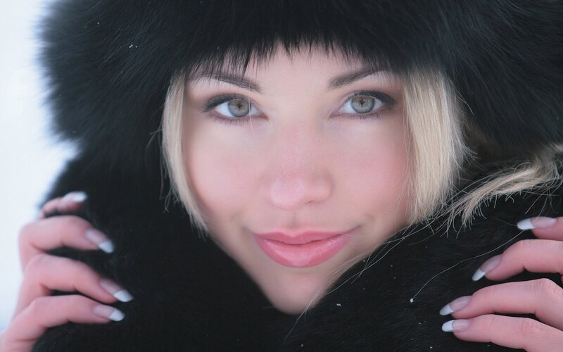 woman in fur hat outdoors