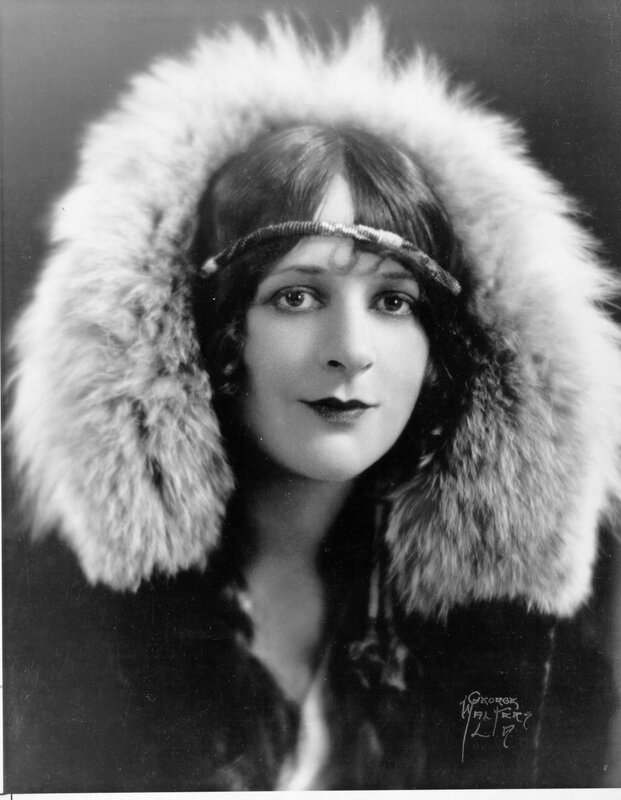 woman in fur hood