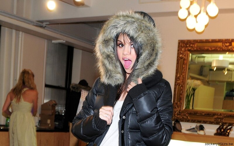 woman in fur-hooded jacket