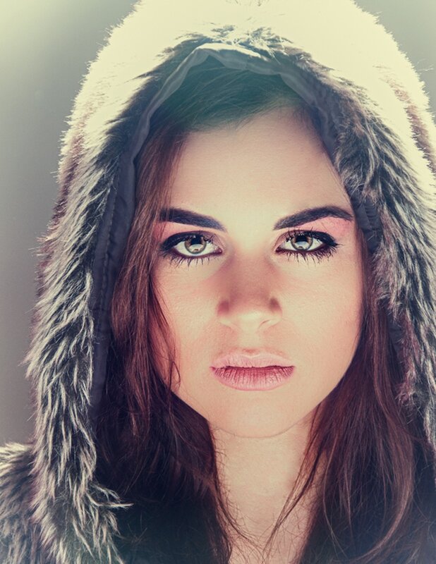 woman in fur-lined hood