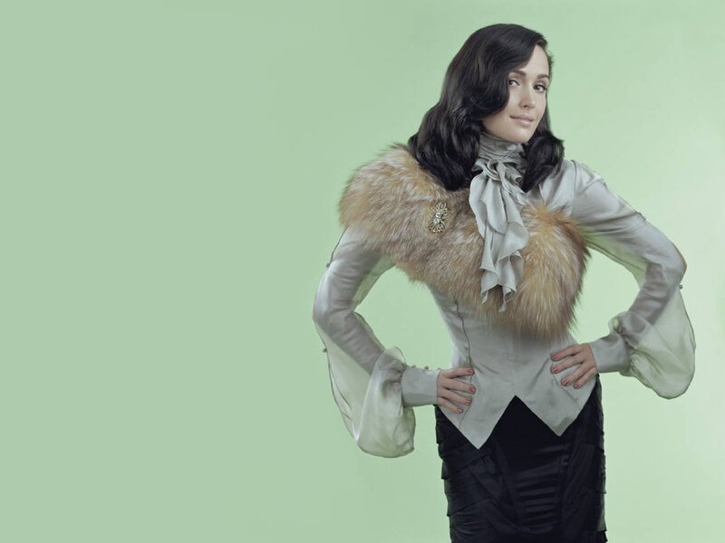 woman in fur stole and blouse