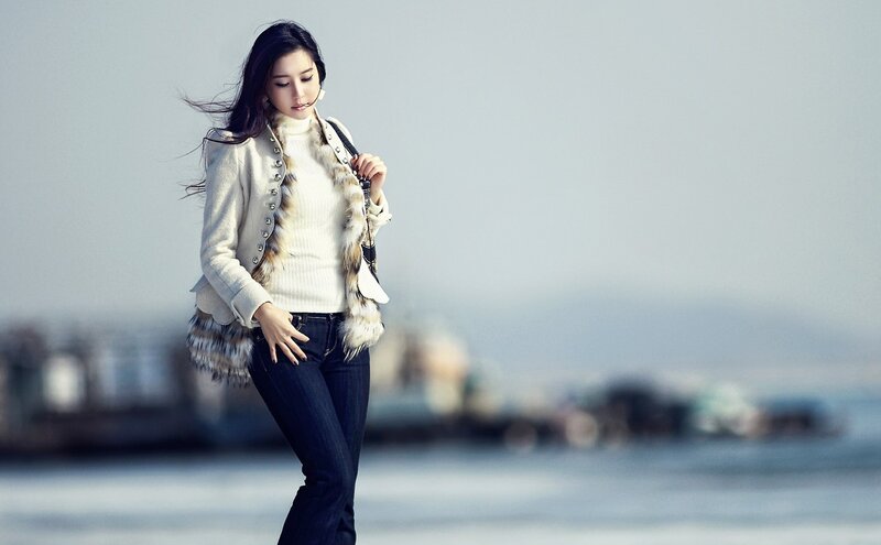woman in fur-trimmed jacket