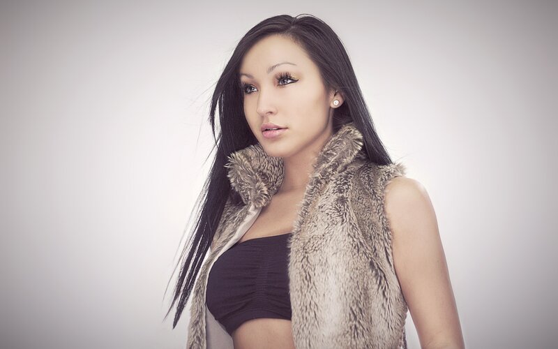 woman in fur vest