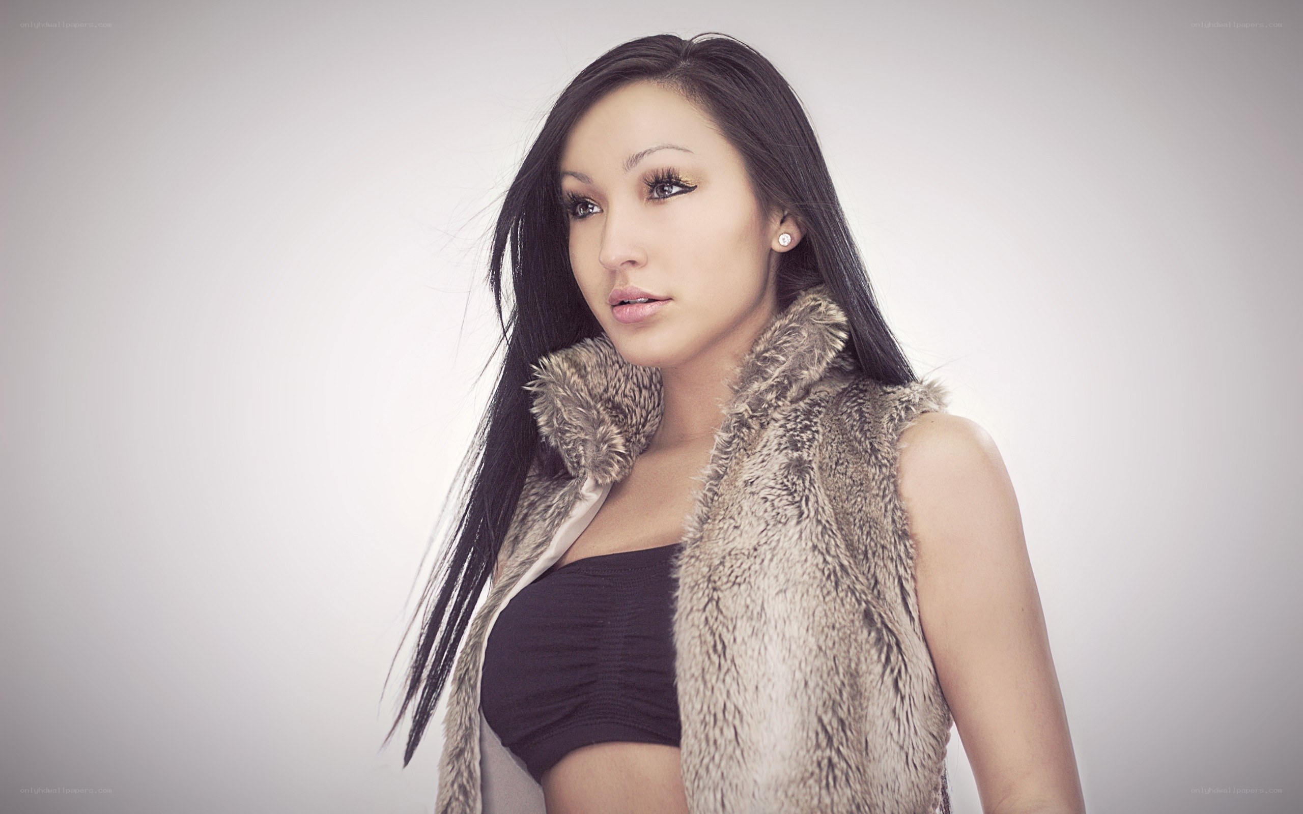 woman in fur vest