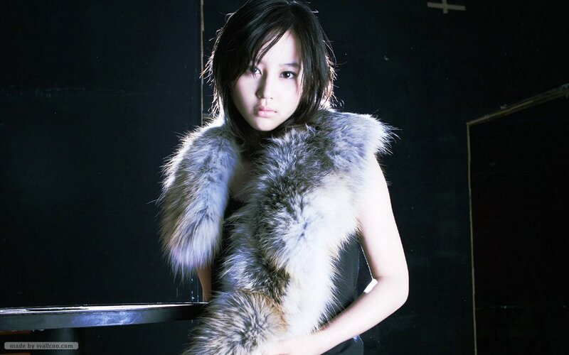 woman in fur vest