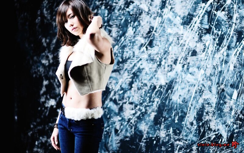 woman in fur vest posing