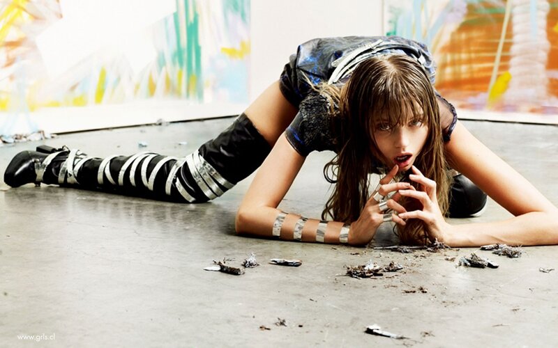woman in futuristic outfit on floor