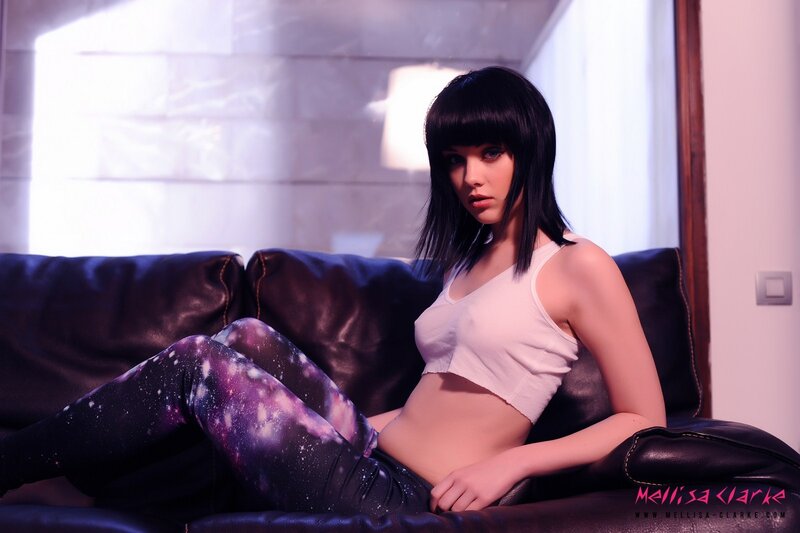 woman in galaxy leggings on couch