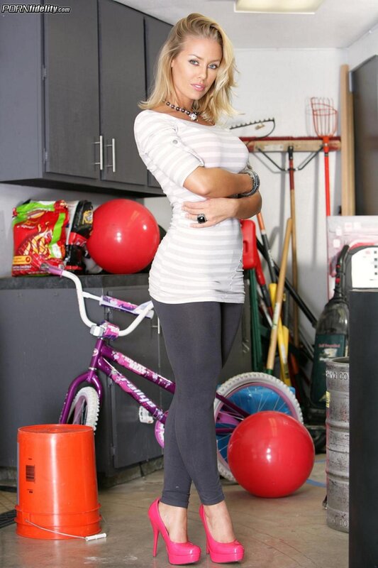 Woman in garage with bicycle