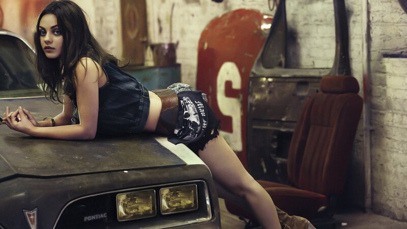 woman in garage with car