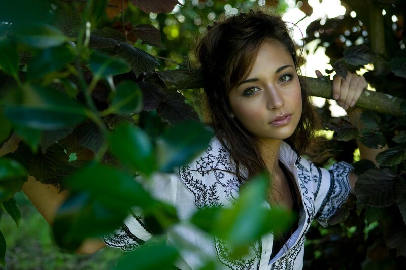 woman in garden foliage