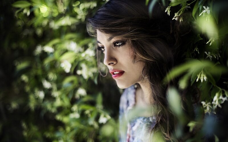 woman in garden foliage