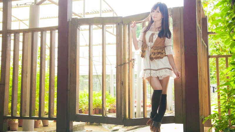 woman in garden gate