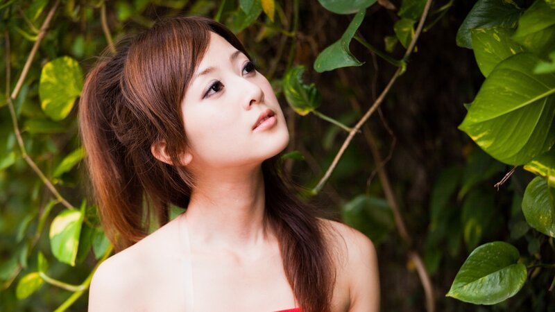 woman in garden looking up