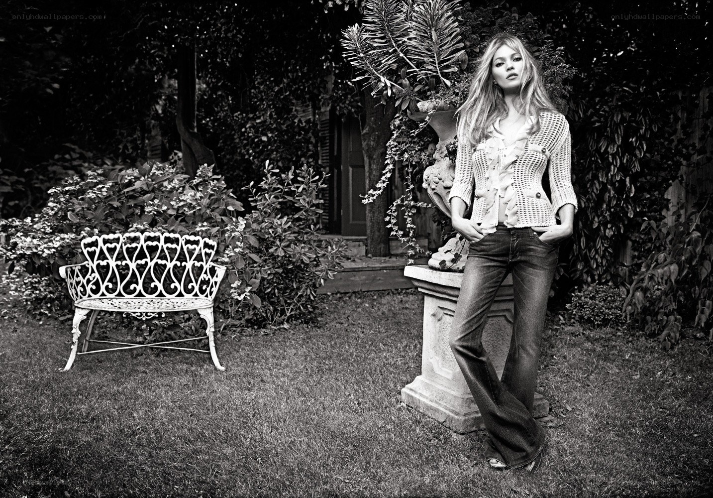woman in garden with bench