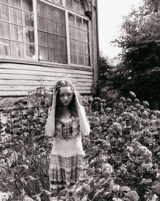 woman in garden with crown