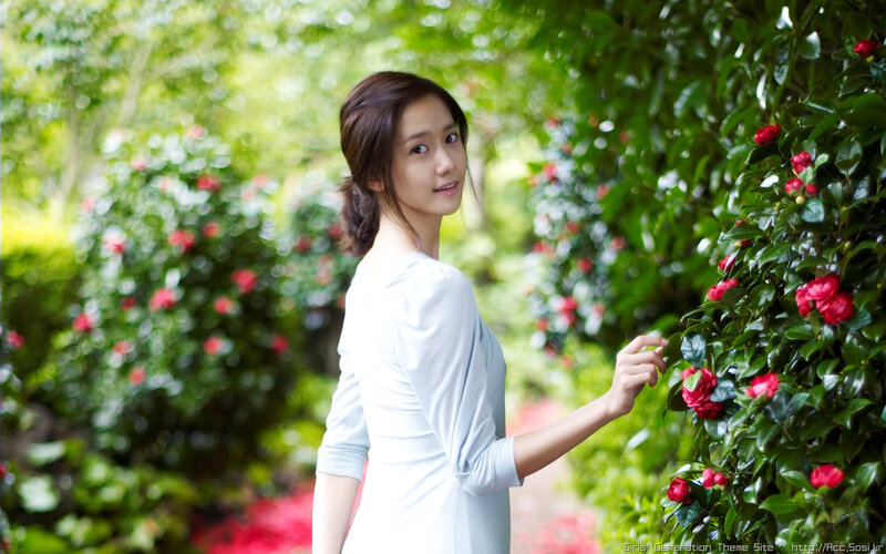 woman in garden with flowers