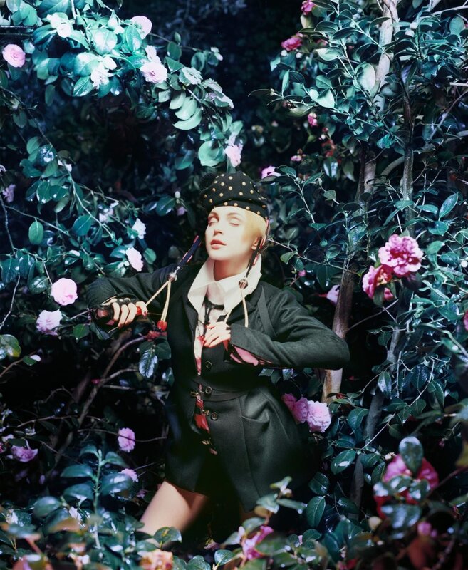 woman in garden with flowers