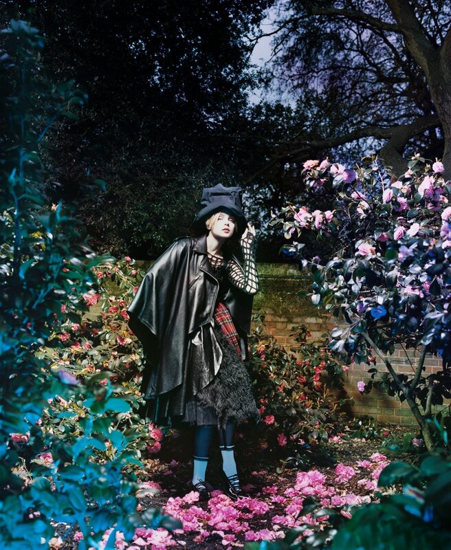 woman in garden with flowers