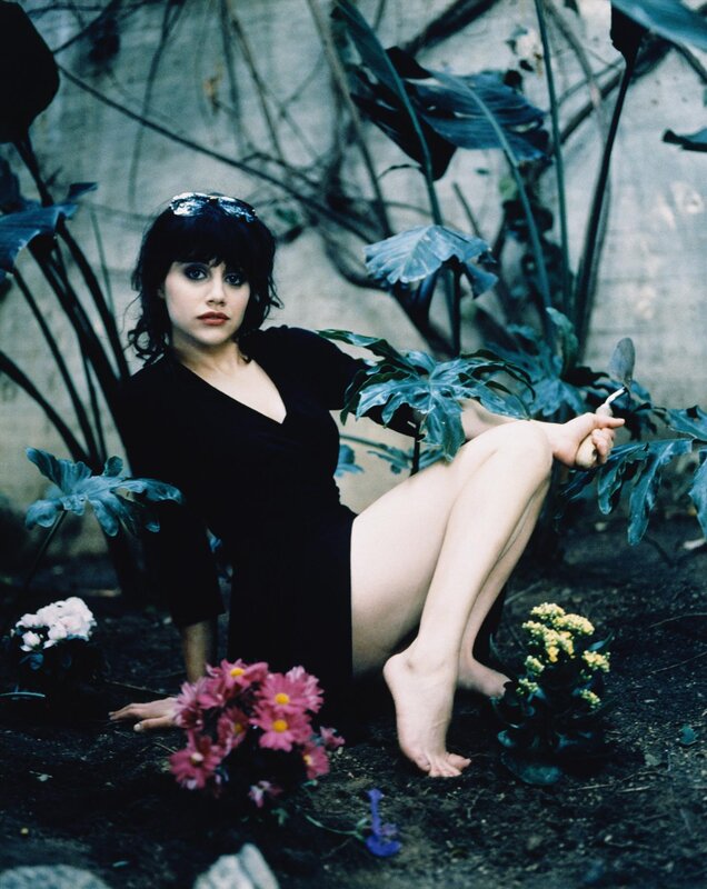 woman in garden with flowers