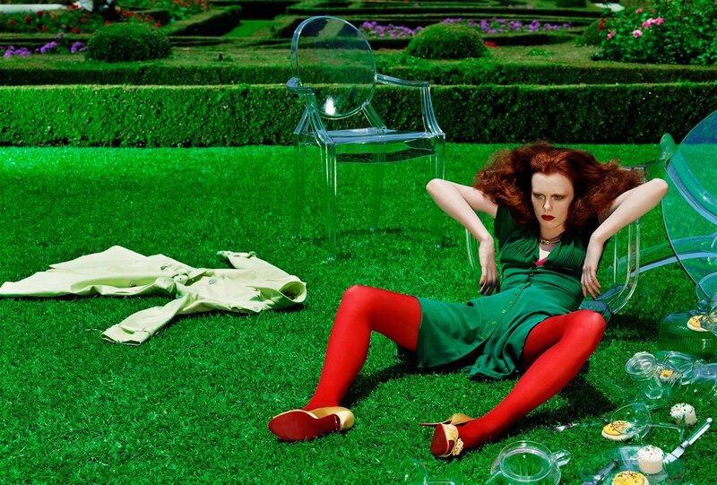 Woman in garden with tea set