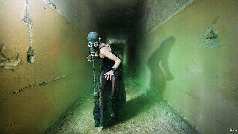 woman in gas mask corridor