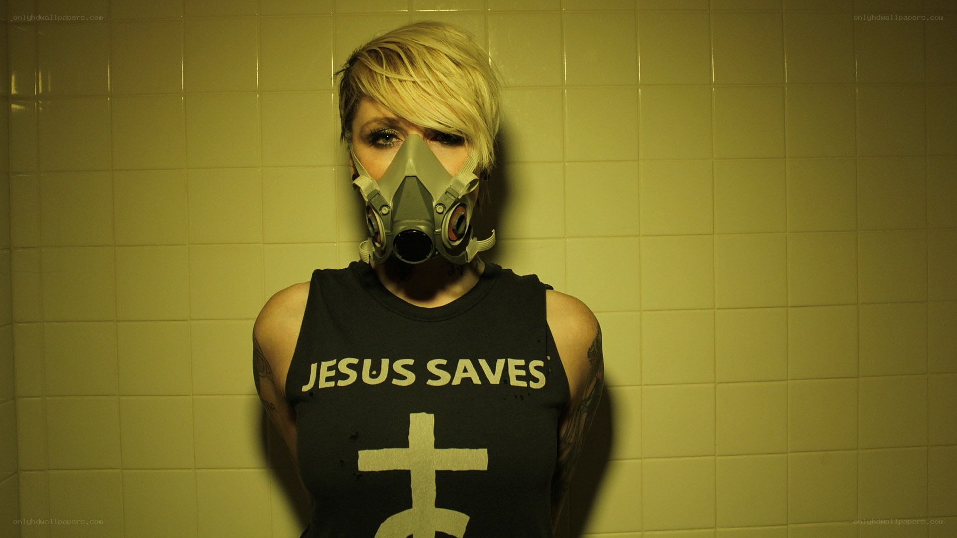 woman in gas mask with Jesus saves shirt