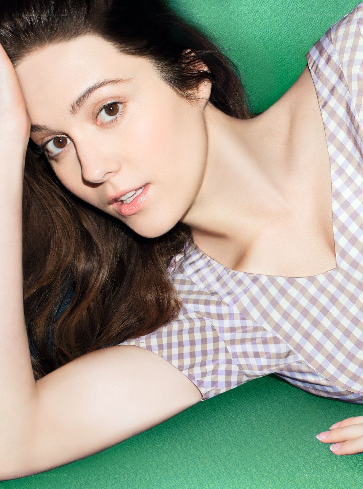 woman in gingham top