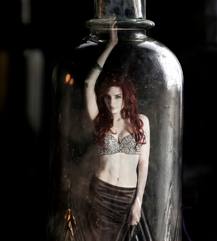 woman in glass bottle