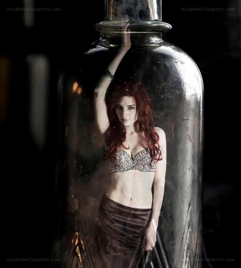 woman in glass bottle